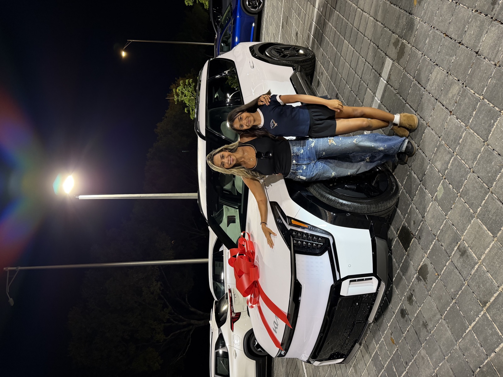Doral Kia customer with their new car